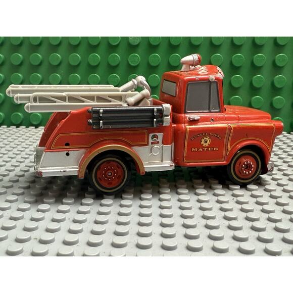 Disney/Pixar Cars Rescue Squad Mater Nurse Gto Die-Cast  Mattel Disney Pixar Cars Toon Rescue Squad Mater Die cast 4” - 1 Missing Mirror